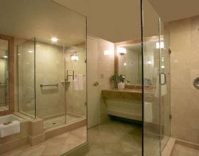 Guest bathroom with shower at Hilton Los Angeles Airport.
