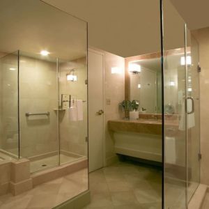 Guest bathroom with shower at Hilton Los Angeles Airport.