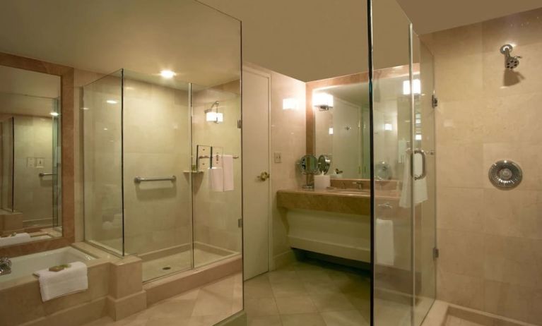 Guest bathroom with shower at Hilton Los Angeles Airport.