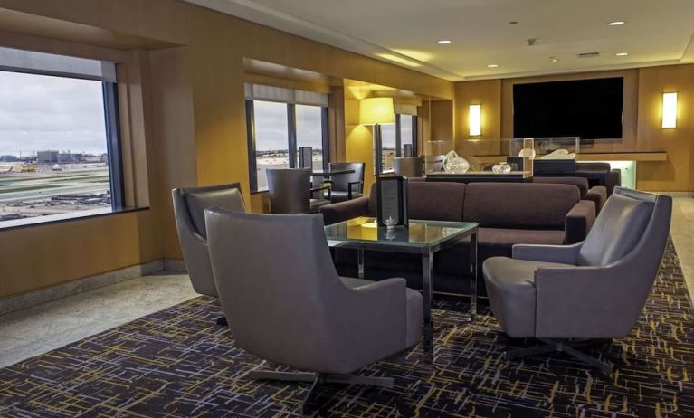 Lounge and coworking space at Hilton Los Angeles Airport.