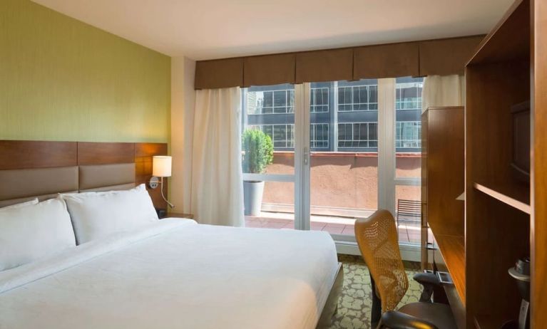 Delux king room with natural light at Hilton Garden Inn New York/Manhattan-Midtown East.