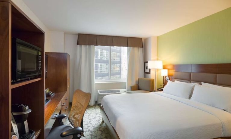 King room with TV and work station at Hilton Garden Inn New York/Manhattan-Midtown East.