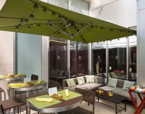 Outdoor terrace and coworking space at Hilton Garden Inn New York/Manhattan-Midtown East.