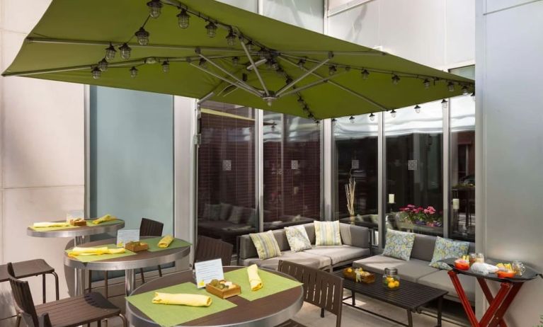 Outdoor terrace and coworking space at Hilton Garden Inn New York/Manhattan-Midtown East.