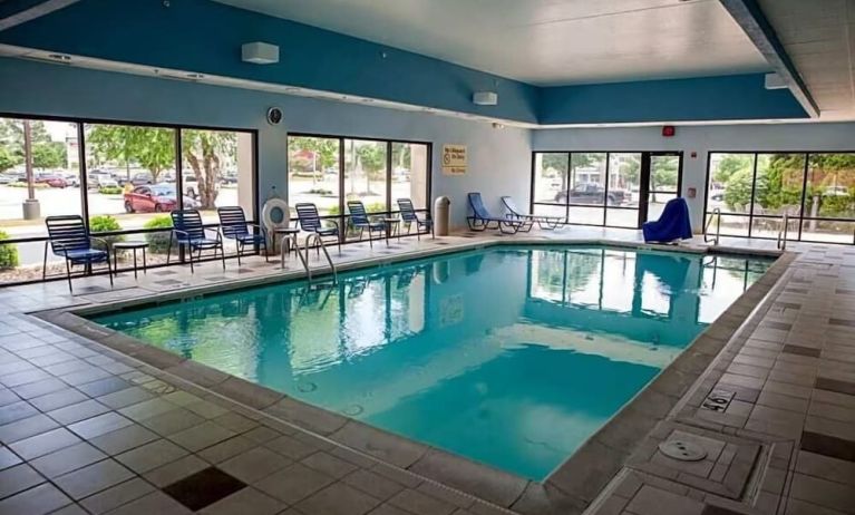 Stunning indoor pool with seating area at Hampton Inn Bentonville/Rogers.