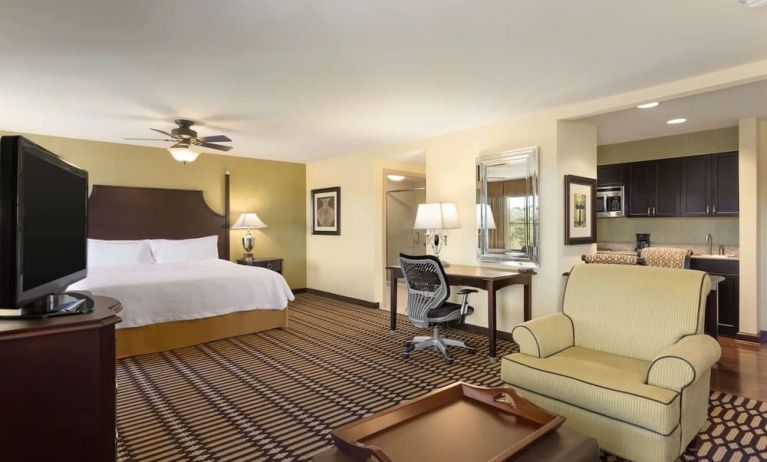 King bed with TV and work station at Homewood Suites By Hilton Lafayette-Airport, LA.