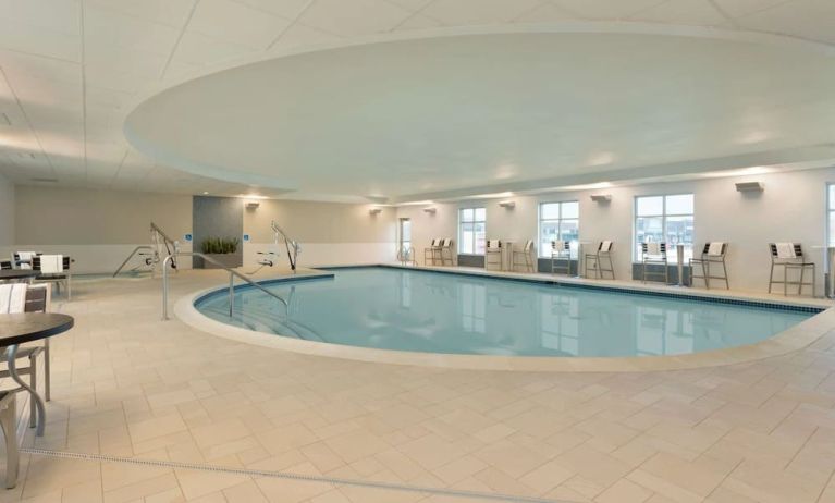 Relaxing indoor pool at Hampton Inn & Suites Rosemont Chicago O'Hare.