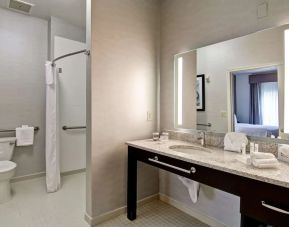 Private guest bathroom with shower at Homewood Suites By Hilton Newark-Cranford.
