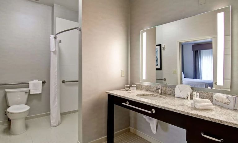 Private guest bathroom with shower at Homewood Suites By Hilton Newark-Cranford.