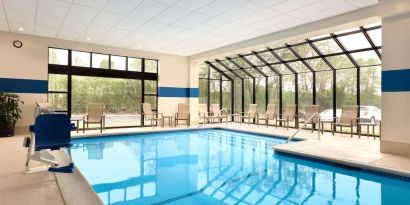 Lovely indoor pool with seating area at DoubleTree By Hilton Hartford - Bradley Airport.