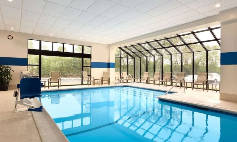 Lovely indoor pool with seating area at DoubleTree By Hilton Hartford - Bradley Airport.