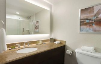 Private guest bathroom at DoubleTree By Hilton Hartford - Bradley Airport.