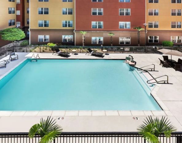 Large outdoor pool at Homewood Suites By Hilton Shreveport / Bossier City, LA.