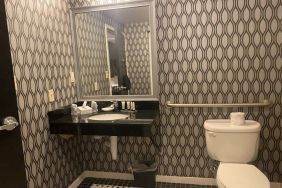 Guest bathroom with shower at Park Manor Hotel.