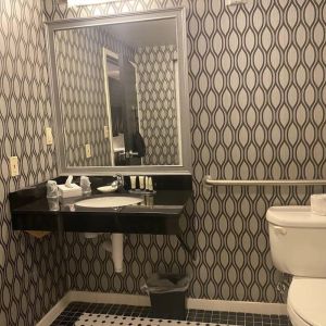 Guest bathroom with shower at Park Manor Hotel.