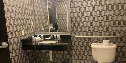 Guest bathroom with shower at Park Manor Hotel.