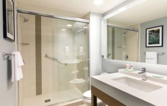 Guest bathroom with shower at Hyatt Place Charleston - Historic District.