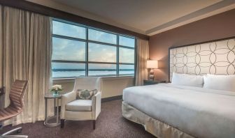 Delux king room with natural light at Hilton Baton Rouge Capitol Center.