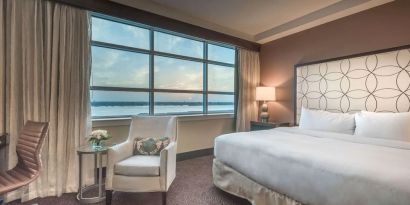 Delux king room with natural light at Hilton Baton Rouge Capitol Center.