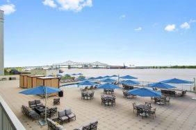 Lovely outdoor terrace and coworking space at Hilton Baton Rouge Capitol Center.