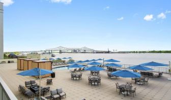 Lovely outdoor terrace and coworking space at Hilton Baton Rouge Capitol Center.