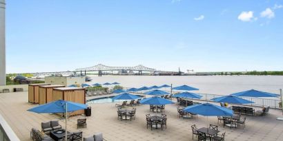 Lovely outdoor terrace and coworking space at Hilton Baton Rouge Capitol Center.