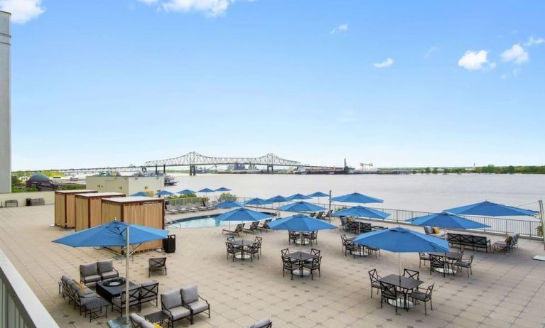 Lovely outdoor terrace and coworking space at Hilton Baton Rouge Capitol Center.