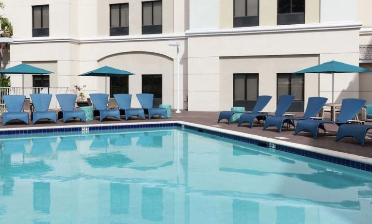 Stunning outdoor pool to relax in at Hampton Inn & Suites Miami-Doral/Dolphin Mall.