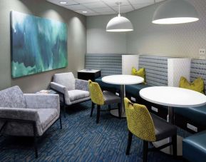 Lounge and coworking space at Hampton Inn & Suites Miami-Doral/Dolphin Mall.
