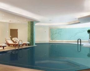 Relaxing indoor pool at Hilton Berlin.