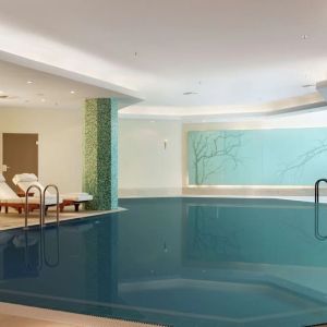 Relaxing indoor pool at Hilton Berlin.