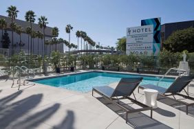 Stunning outdoor pool at H Hotel Los Angeles, Curio Collection By Hilton.