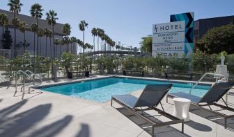 Stunning outdoor pool at H Hotel Los Angeles, Curio Collection By Hilton.