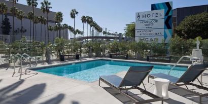 Stunning outdoor pool at H Hotel Los Angeles, Curio Collection By Hilton.