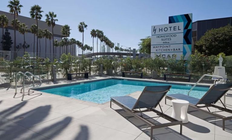 Stunning outdoor pool at H Hotel Los Angeles, Curio Collection By Hilton.