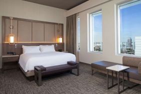 Delux king with natural light at H Hotel Los Angeles, Curio Collection By Hilton.