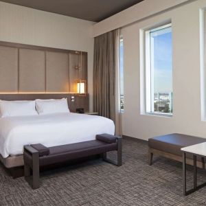 Delux king with natural light at H Hotel Los Angeles, Curio Collection By Hilton.