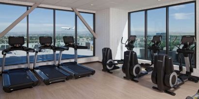 Equipped fitenss center at H Hotel Los Angeles, Curio Collection By Hilton.