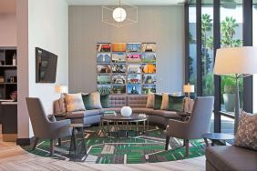 Lounge and coworking space at H Hotel Los Angeles, Curio Collection By Hilton.