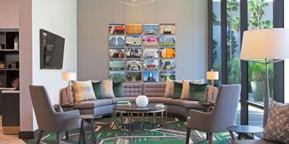 Lounge and coworking space at H Hotel Los Angeles, Curio Collection By Hilton.