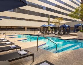 Lovely outdoor pool with pool chairs at Hyatt Regency Phoenix.