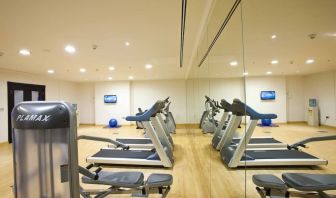 Equipped fitness center at Millennium Central Doha.