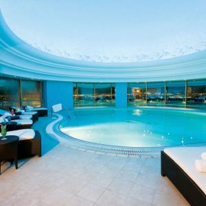 Stunning indoor pool at Millennium Hotel Doha.