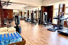 Equipped fitness center at Millennium Hotel Doha.