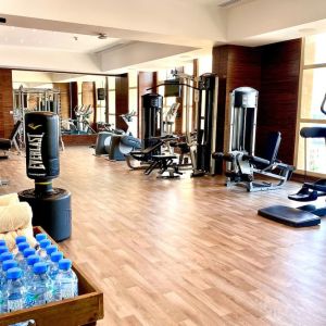 Equipped fitness center at Millennium Hotel Doha.