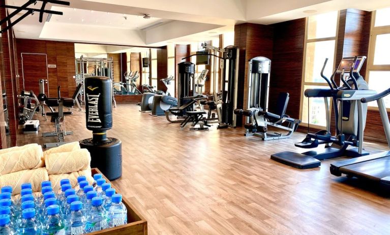 Equipped fitness center at Millennium Hotel Doha.