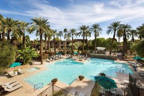 Relaxing outdoor pool with pool chairs at DoubleTree Resort By Hilton Paradise Valley - Scottsdale.