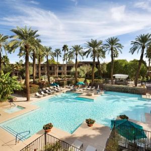 Relaxing outdoor pool with pool chairs at DoubleTree Resort By Hilton Paradise Valley - Scottsdale.