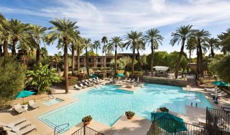 Relaxing outdoor pool with pool chairs at DoubleTree Resort By Hilton Paradise Valley - Scottsdale.