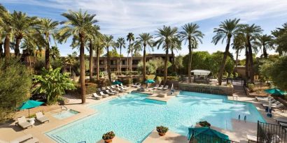 Relaxing outdoor pool with pool chairs at DoubleTree Resort By Hilton Paradise Valley - Scottsdale.